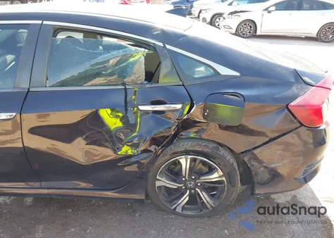 2017 Honda Civic Touring from USA, damaged, VIN 19XFC1F9XHE010146